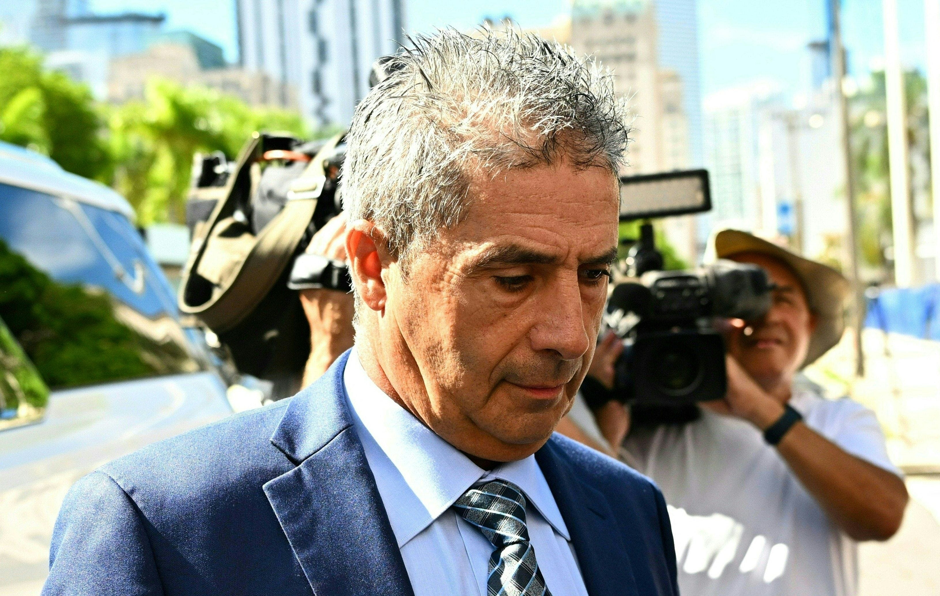 Carlos De Oliveira, personal aide to former President Donald Trump, arrives for his initial court appearance at the James L. King Federal Courthouse in Miami, Florida, on July 31, 2023. He is charged with trying to delete security camera footage, conspiring with Mar-A-Lago employees to destroy evidence and lying to FBI agents.