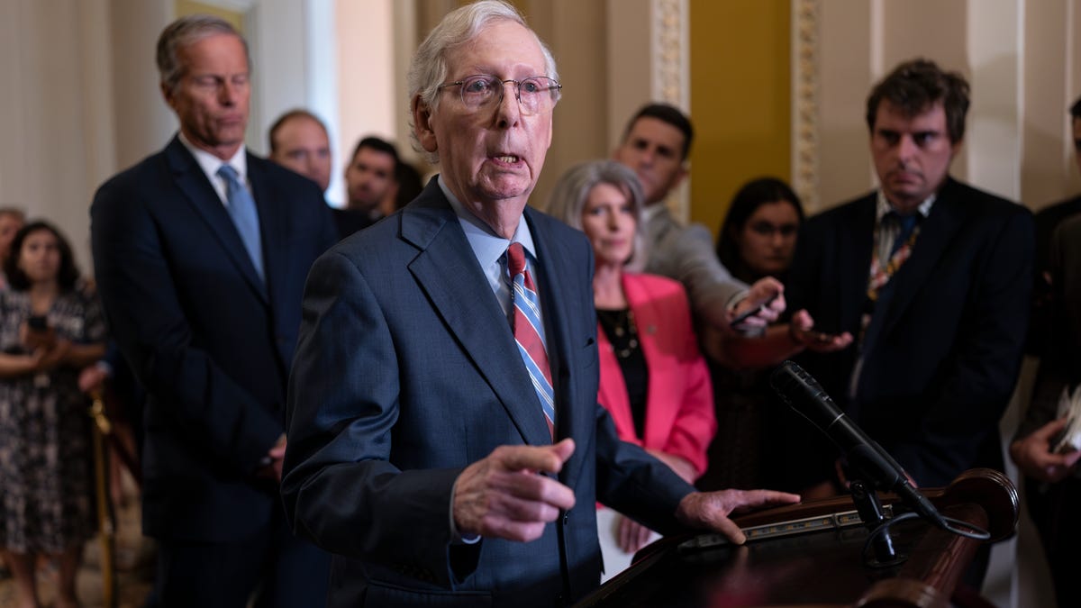 Senate Minority Leader Mitch McConnell, R-Ky., returns to his news conference on July 26, 2023, after the 81-year-old froze at the microphones for almost 30 seconds.