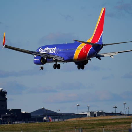A Southwest Airlines flight from Bradley International Airport makes its landing approach onto Baltimore-Washington International Thurgood Marshall Airport, Monday, Nov. 23, 2020, in Glen Burnie, Md.
