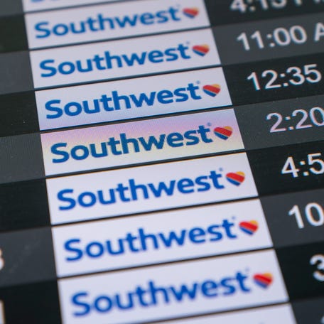 A screen shows arrival times for Southwest Airlines flights at the Los Angeles International Airport in Los Angeles, Tuesday, April 18, 2023.