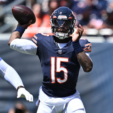 Chicago Bears quarterback P.J. Walker (15) passes against the Tennessee Titans in the first half at Soldier Field.