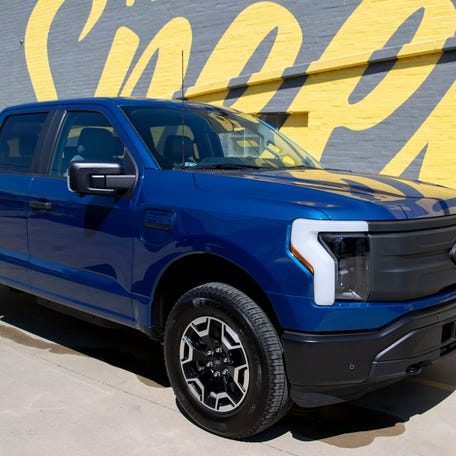 The new Ford F-150 Lightning, an all-electric truck, is parked outside the Edge Motor Museum on Wednesday, June 29, 2022, in Memphis.