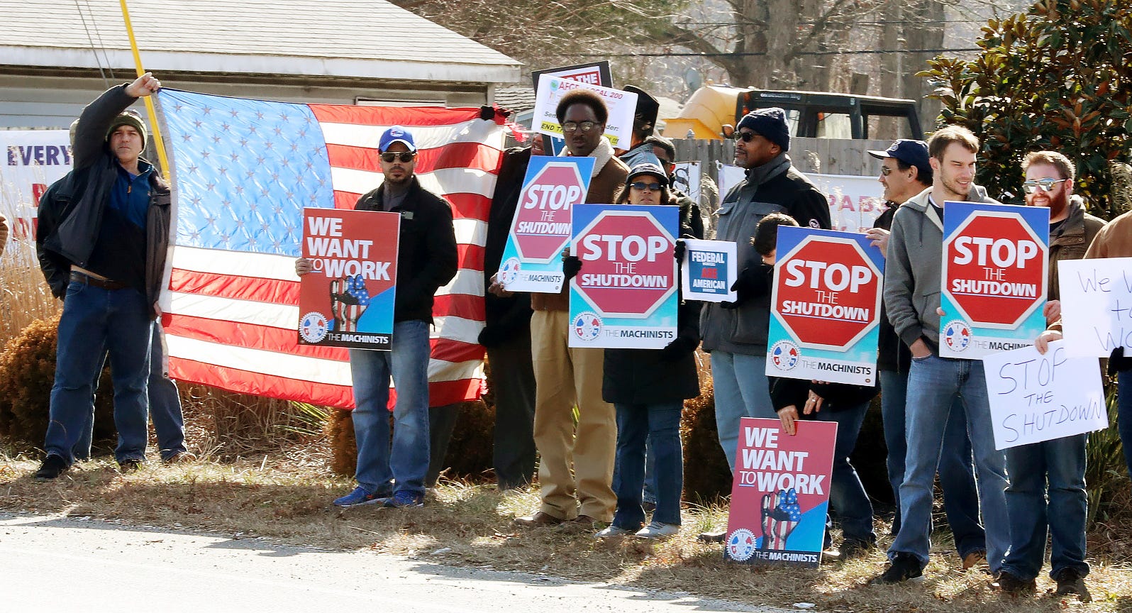 Federal workers and contractors in Harbor Township, N.J., on Jan. 25, 2019, protest the government shutdown. The federal shutdown lasted for 35 days.