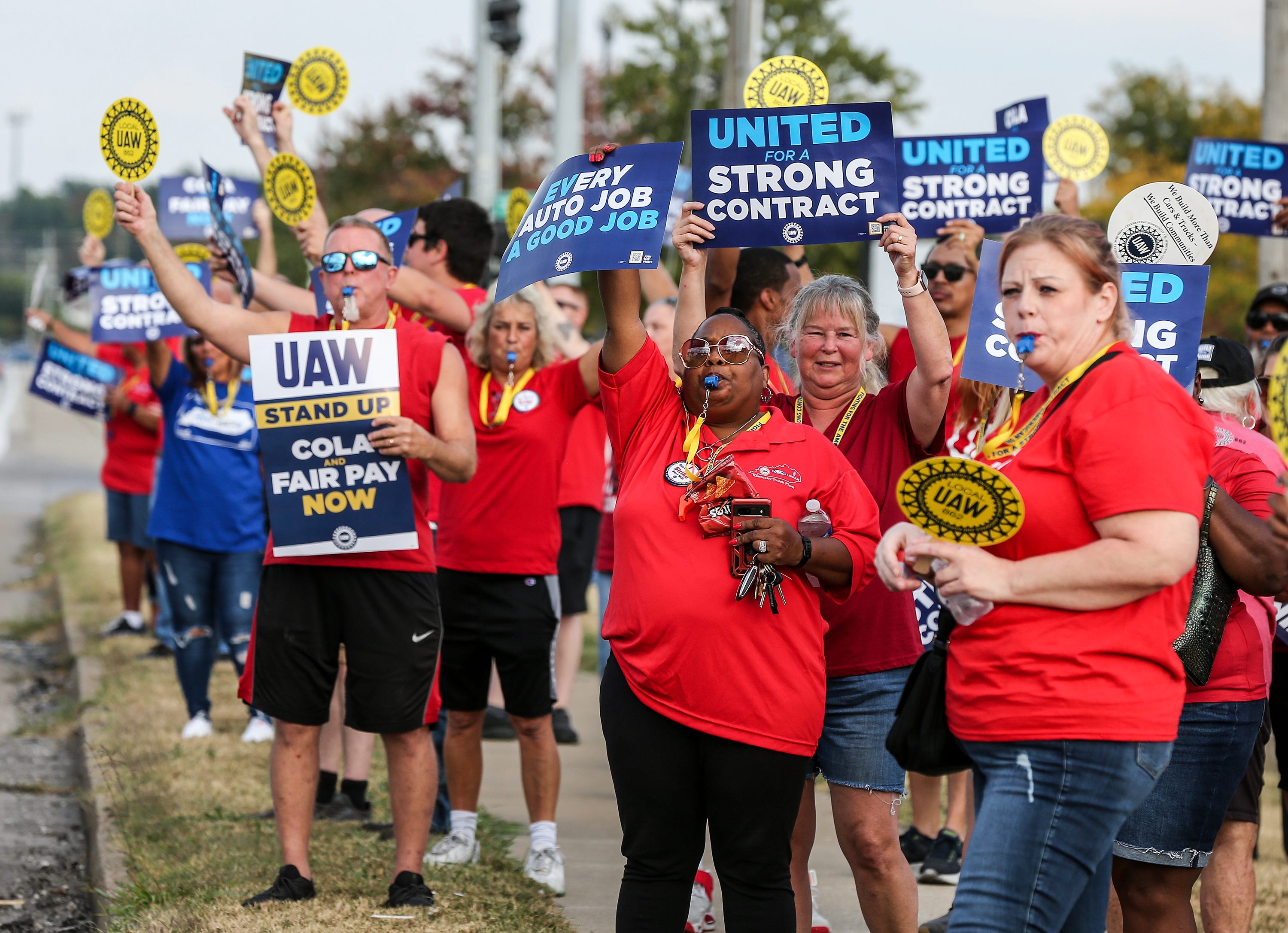 UAW 862 members held picket signs to garner support from passing motorists on Fern Valley Rd on Thursday, September 21, 2023