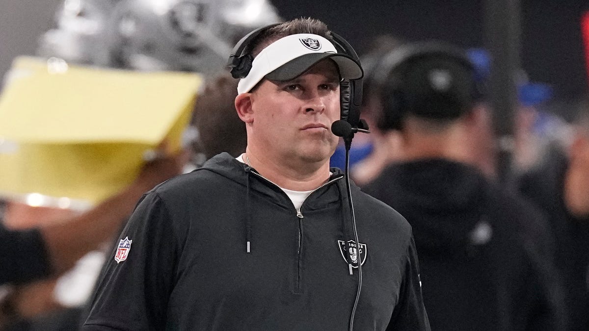Las Vegas Raiders head coach Josh McDaniels walks on the sideline during the first half of an NFL football game against the Pittsburgh Steelers Sunday, Sept. 24, 2023, in Las Vegas.