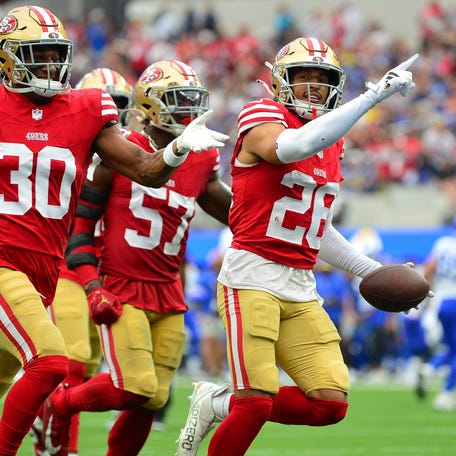 San Francisco 49ers cornerback Isaiah Oliver (26) celebrates after recovering a fumble against the Los Angeles Rams during the second half at SoFi Stadium.