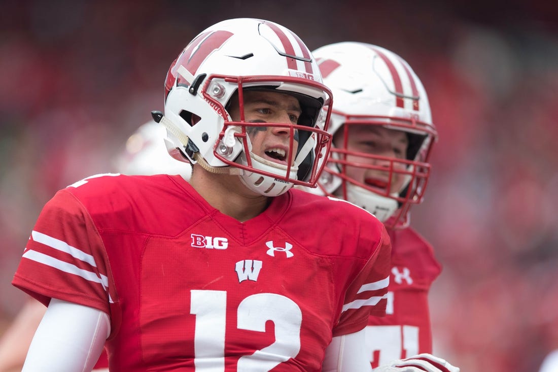Wisconsin Badgers quarterback Alex Hornibrook (12) will return to the lineup Saturday against Rutgers.