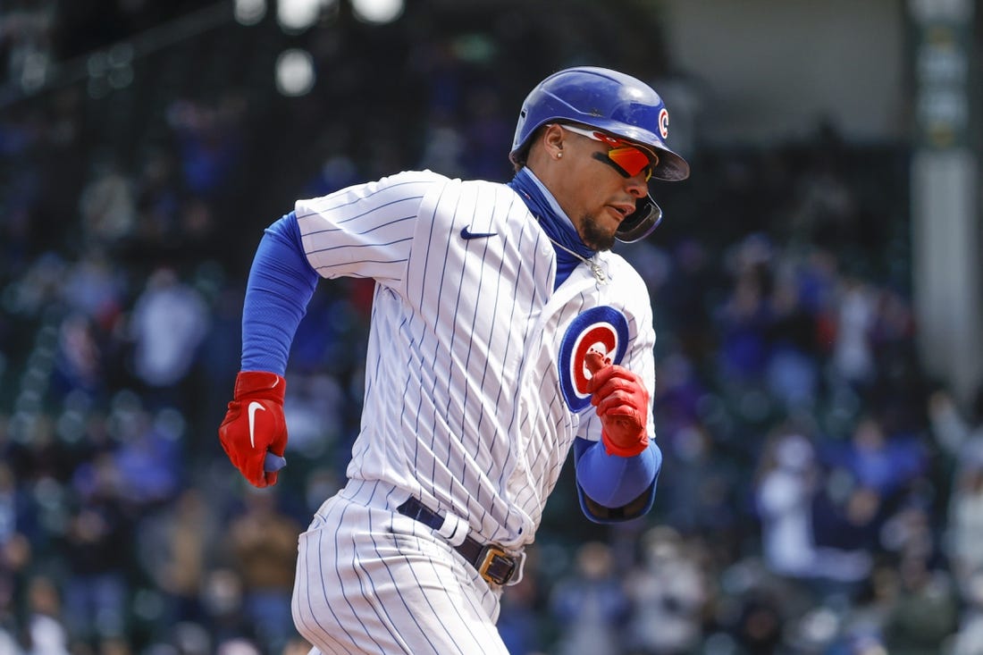 Cubs launch six homers while routing Braves