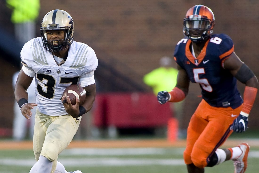 Purdue Boilermakers running back Brian Lankford-Johnson (37) is pursued by Illinois Fighting Illini linebacker James Crawford (5) during the fourth quarter at Memorial Stadium on Oct. 8, 2016.