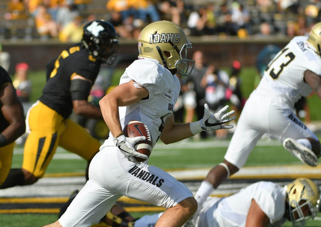 Idaho, shown with wide receiver Mason Petrino (4) running with the ball against Missouri last season, officially made the swtch down to FCS status Sunday.