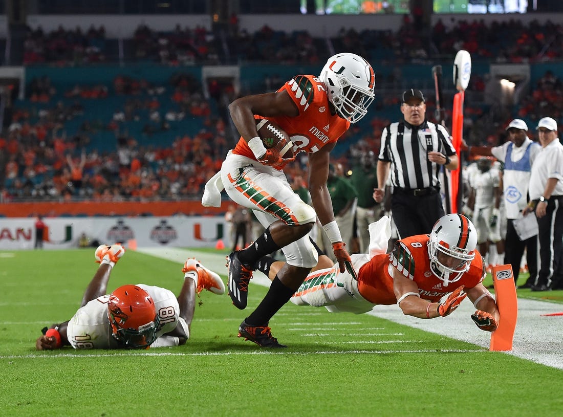 Miami Hurricanes tight end Michael Irvin II scores a touchdown against the Florida A&M Rattlers during the second half at Hard Rock Stadium on Sept. 3, 2016.