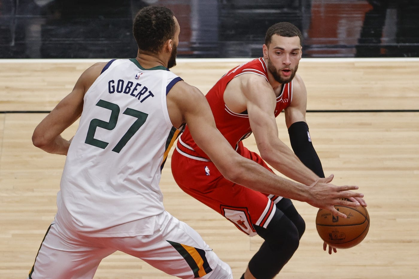 Mar 22, 2021; Chicago, Illinois, USA; Utah Jazz center Rudy Gobert (27) defends against Chicago Bulls guard Zach LaVine (8) during the second half of an NBA game at United Center.