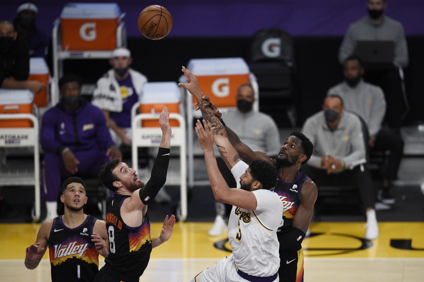 May 9, 2021; Los Angeles, California, USA; Phoenix Suns center Deandre Ayton (22) fouls Los Angeles Lakers forward Anthony Davis (3) on a shot attempt during the second half at Staples Center. Mandatory Credit: Kelvin Kuo-USA TODAY Sports