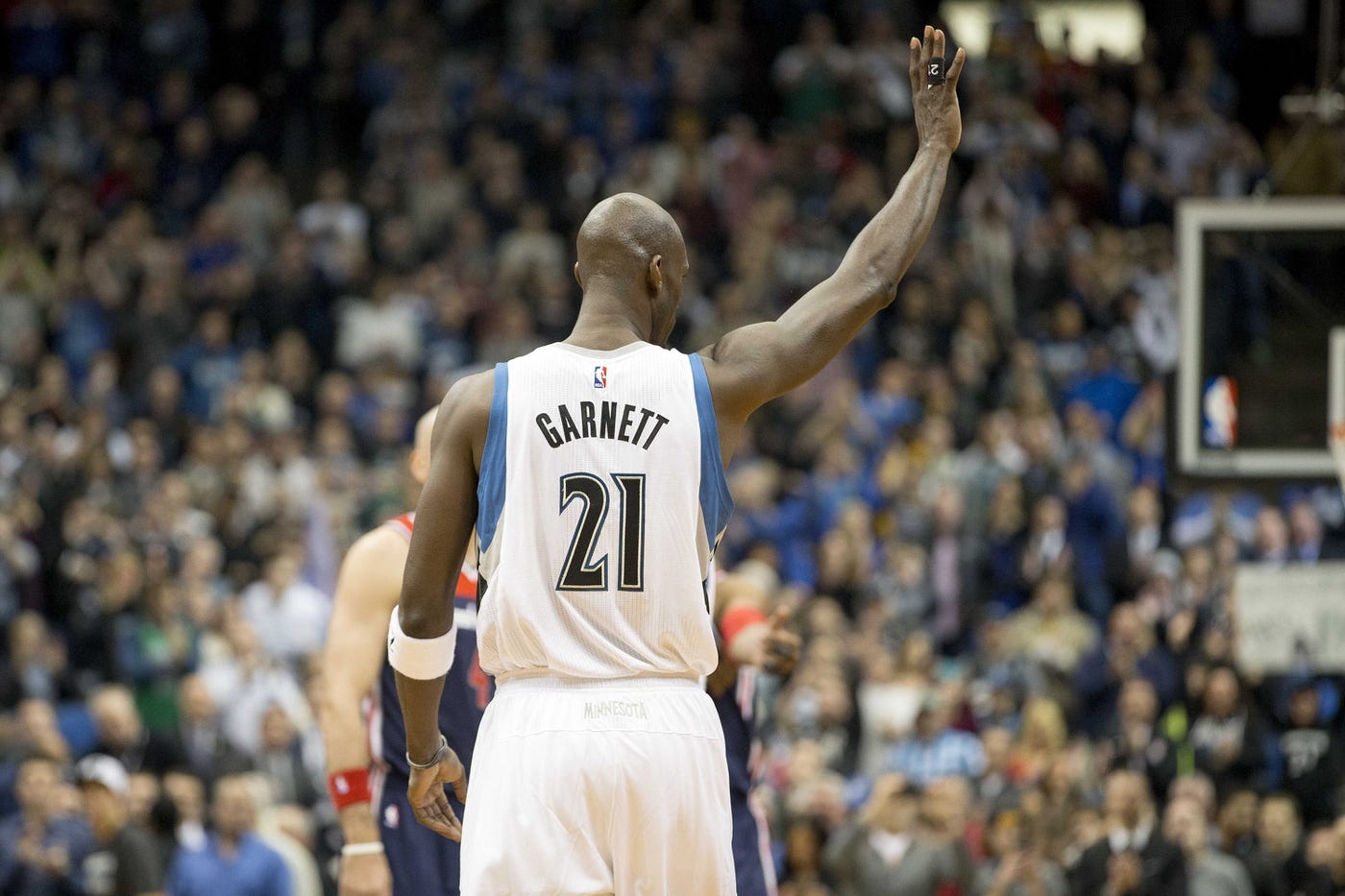 Feb 25, 2015; Minneapolis, MN, USA; Minnesota Timberwolves forward Kevin Garnett (21) waves to fans during a game against the Washington Wizards at Target Center.