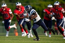 Aug 24, 2023; Columbus, Ohio, USA; KIPP Columbus wide receiver Deshun Bosley (13) outpaces Eastmoor Academy players to take the opening kickoff for touchdown during a high school football game between the two teams.