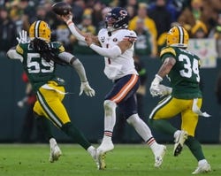 Chicago Bears quarterback Justin Fields (1) throws a pass against the Green Bay Packers on Sunday, January 7, 2024, at Lambeau Field in Green Bay, Wis. Tork Mason/USA TODAY NETWORK-Wisconsin