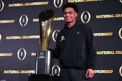 Jan 9, 2024; Houston, TX, USA; Michigan Wolverines cornerback Will Johnson poses with College Football National Championship trophy at press conference at JW Marriot Houston by the Galleria. Mandatory Credit: Kirby Lee-USA TODAY Sports