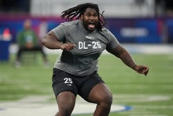 Feb 29, 2024; Indianapolis, IN, USA; Texas defensive lineman TVondre Sweat (DL25) works out during the 2024 NFL Combine at Lucas Oil Stadium. Mandatory Credit: Kirby Lee-USA TODAY Sports