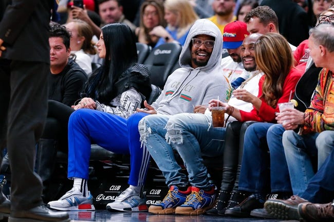 NBA: Houston Rockets at Denver Nuggets - Nov 13, 2018; Denver, CO, USA; Denver Broncos player Von Miller (L) sits with Los Angeles Rams player Aqib Talib (4) as they take in in the second quarter of the game between the Denver Nuggets and the Houston Rockets at the Pepsi Center. Mandatory Credit: Isaiah J. Downing-USA TODAY Sports