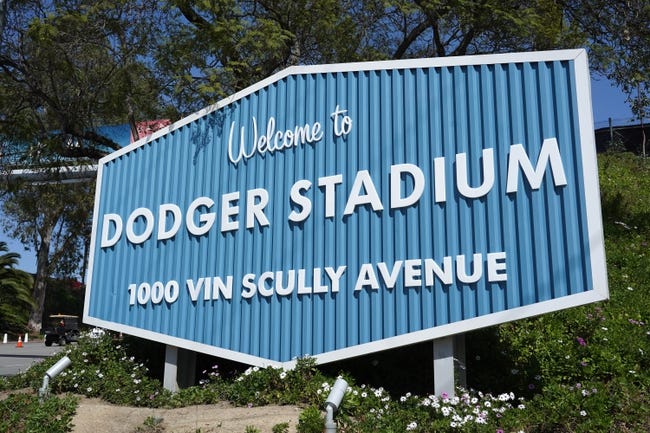 MLB: Spring Training-Los Angeles Angels at Los Angeles Dodgers - Apr 5, 2022; Los Angeles, California, USA; The Welcome to Dodger Stadium sign at Dodger Stadium at 1000 Vin Scully Avenue. Mandatory Credit: Kirby Lee-USA TODAY Sports