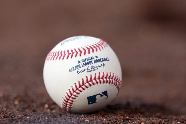 MLB: Spring Training-Los Angeles Angels at Los Angeles Dodgers - Apr 5, 2022; Los Angeles, California, USA; A detailed view of MLB official Rawlings baseball with signature of commissioner Rob Manfred at Dodger Stadium. Mandatory Credit: Kirby Lee-USA TODAY Sports