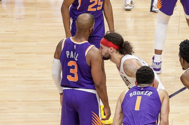 NBA: Playoffs-Phoenix Suns at New Orleans Pelicans - Apr 28, 2022; New Orleans, Louisiana, USA;  New Orleans Pelicans guard Jose Alvarado (15) rests is nose on the arm of Phoenix Suns guard Chris Paul (3) during the second half of game six of the first round for the 2022 NBA playoffs at Smoothie King Center. Mandatory Credit: Stephen Lew-USA TODAY Sports