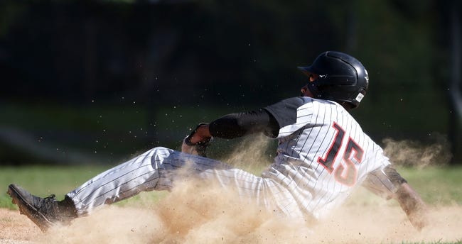 Syndication: The Commercial Appeal - Houston's Donovan Mitchell slides safely into second base during their region semifinal game at Whitehaven High School on Monday, May 16, 2022.Wh Region 17