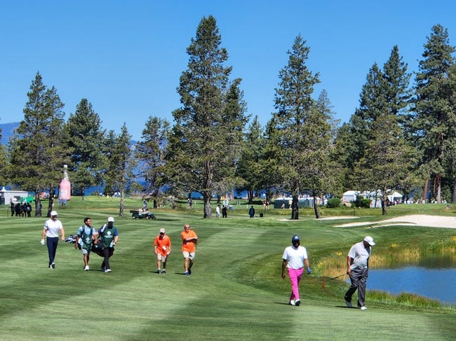 Syndication: Reno Gazette Journal - Charles Barkley, far right, and Anthony Anderson (pink pants) walk up the No. 10 fairway on Friday in the American Century Championship celebrity golf tournament at Edgewood Tahoe.Acc No 10 Friday