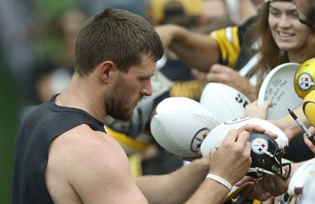 NFL: Pittsburgh Steelers Training Camp - Jul 27, 2022; Latrobe, PA, USA; Pittsburgh Steelers defensive end T.J. Watt (90) signs autographs after participating in training camp at Chuck Noll Field. Mandatory Credit: Charles LeClaire-USA TODAY Sports