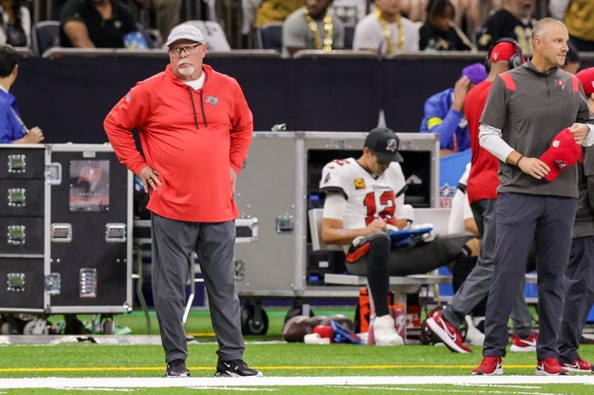 NFL: Tampa Bay Buccaneers at New Orleans Saints - Sep 18, 2022; New Orleans, Louisiana, USA; Tampa Bay Buccaneers Senior Football Consultant Bruce Arians reacts to a play as quarterback Tom Brady (12) looks over the play from the bench against the New Orleans Saints during the first half at Caesars Superdome. Mandatory Credit: Stephen Lew-USA TODAY Sports