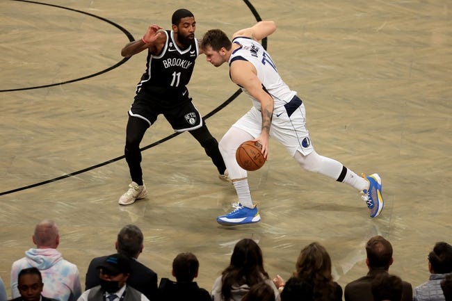 NBA: Dallas Mavericks at Brooklyn Nets - Oct 27, 2022; Brooklyn, New York, USA; Dallas Mavericks guard Luka Doncic (77) controls the ball against Brooklyn Nets guard Kyrie Irving (11) during the fourth quarter at Barclays Center. Mandatory Credit: Brad Penner-USA TODAY Sports