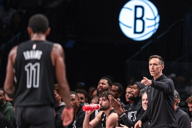 NBA: Indiana Pacers at Brooklyn Nets - Oct 31, 2022; Brooklyn, New York, USA; Brooklyn Nets head coach Steve Nash (right) points towards guard Kyrie Irving (11) during the first half against the Indiana Pacers at Barclays Center. Mandatory Credit: Vincent Carchietta-USA TODAY Sports