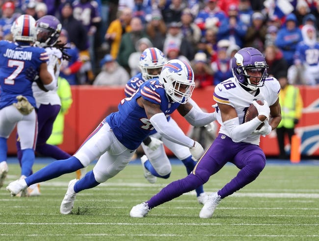 Syndication: Democrat and Chronicle - Vikings receiver Justin Jefferson spins away from Bills Christian Benford after a catch.